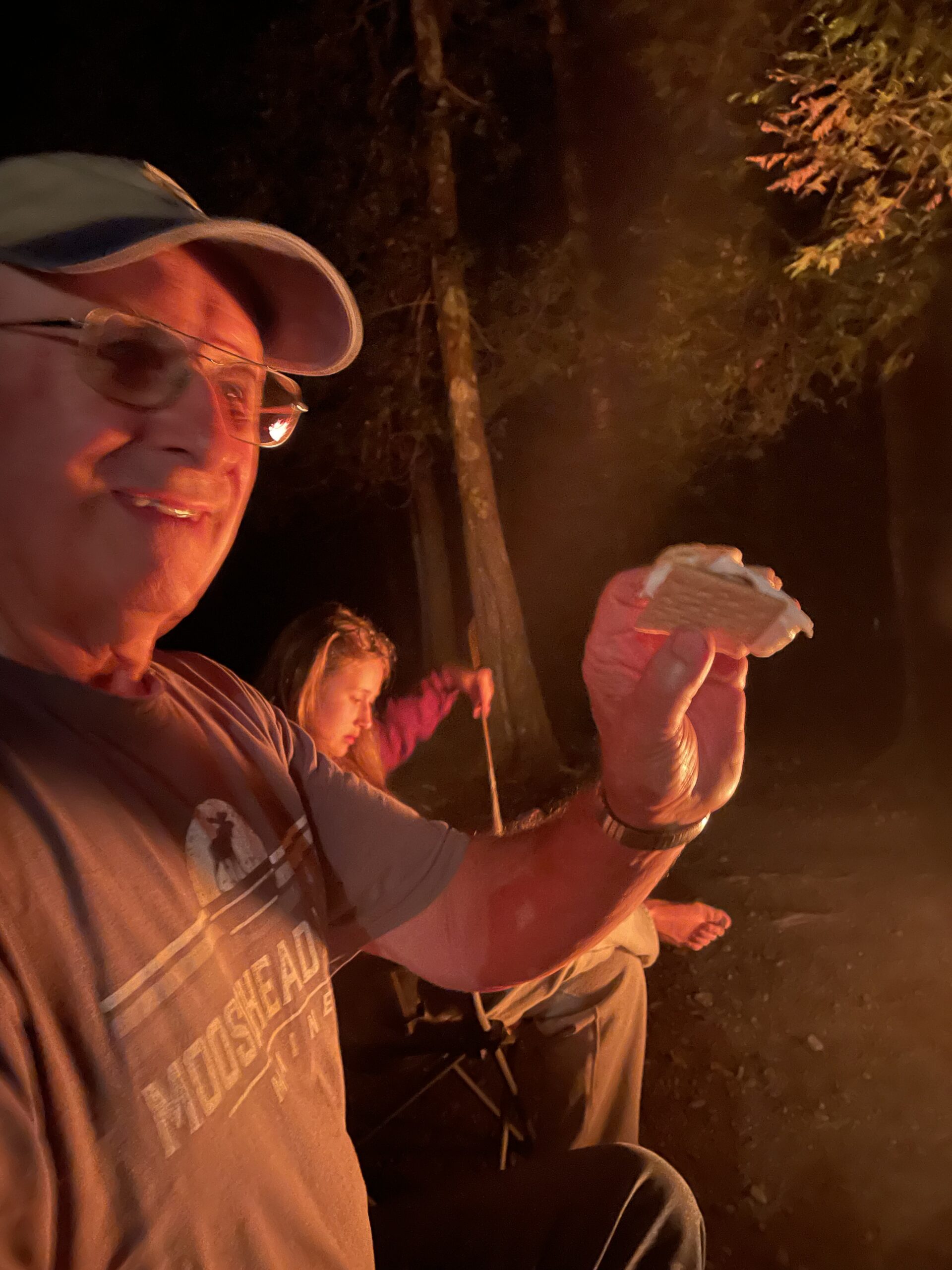 Family camping checklist, Grandpa's first time trying a smores.